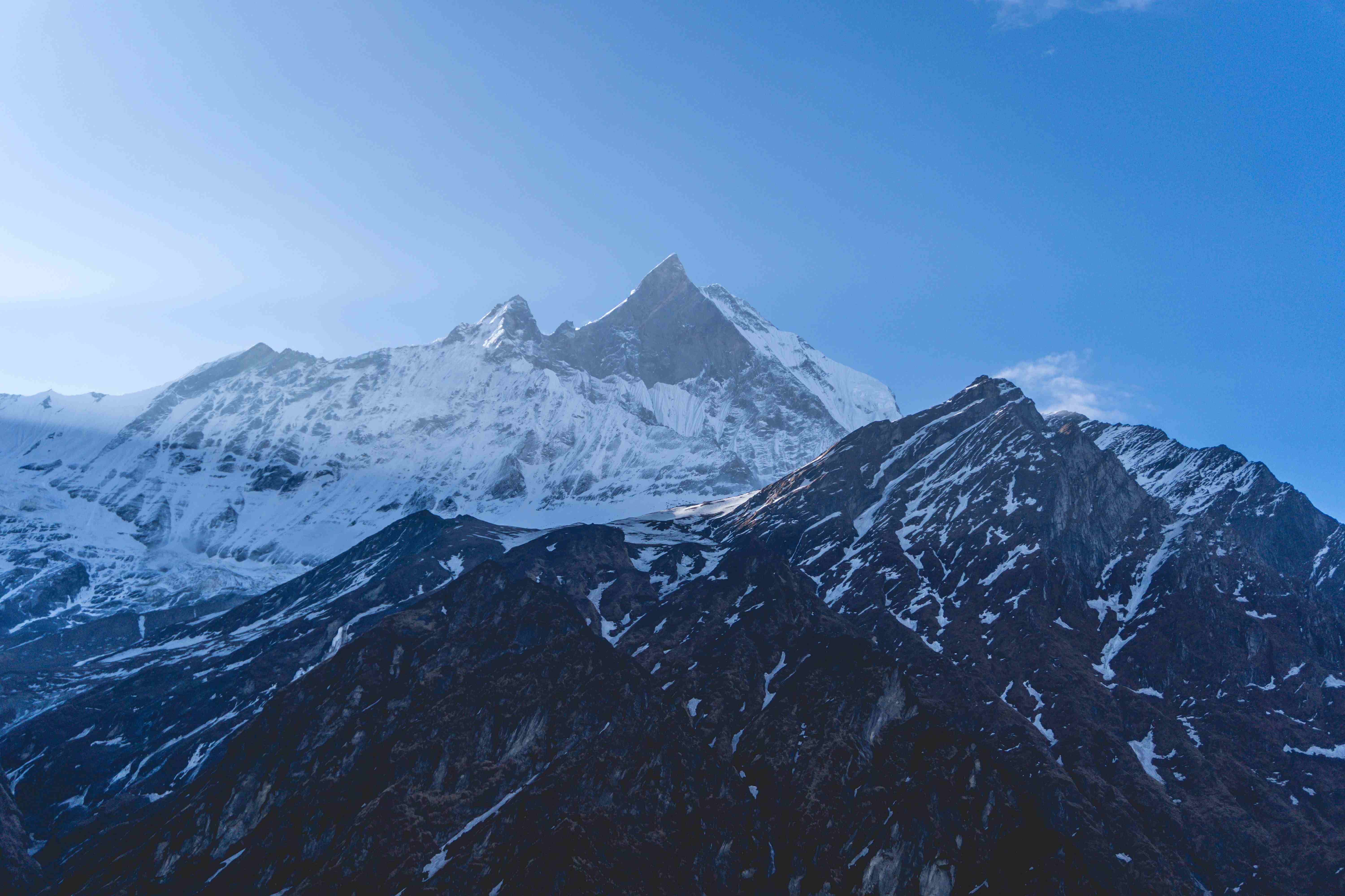 Snow-covered Himalayan peaks visible from Mardi Himal Viewpoint in Annapurna region NepalCaption: