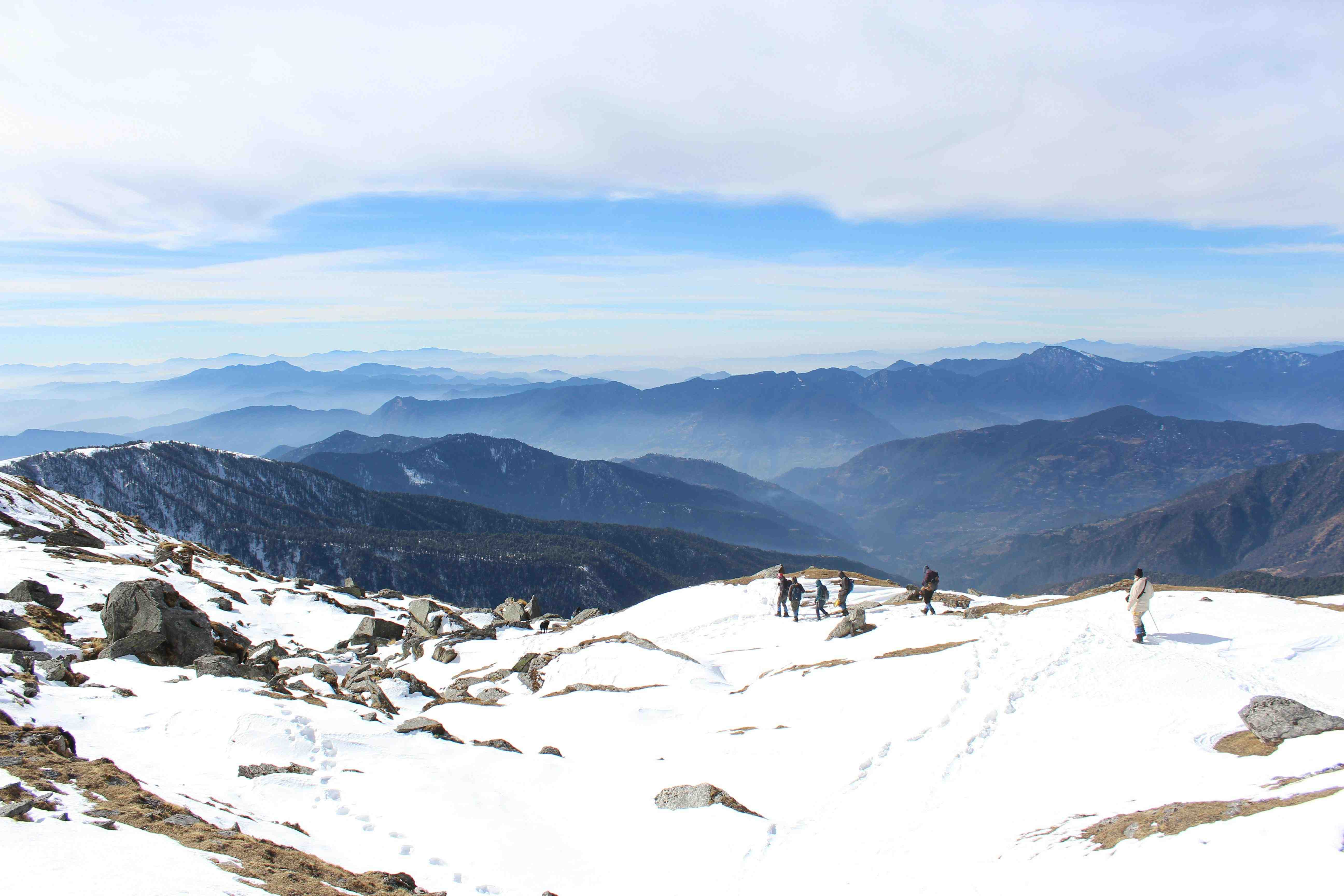 Kedarkantha Summit covered in snow with panoramic Himalayan mountain views in Uttarakhand