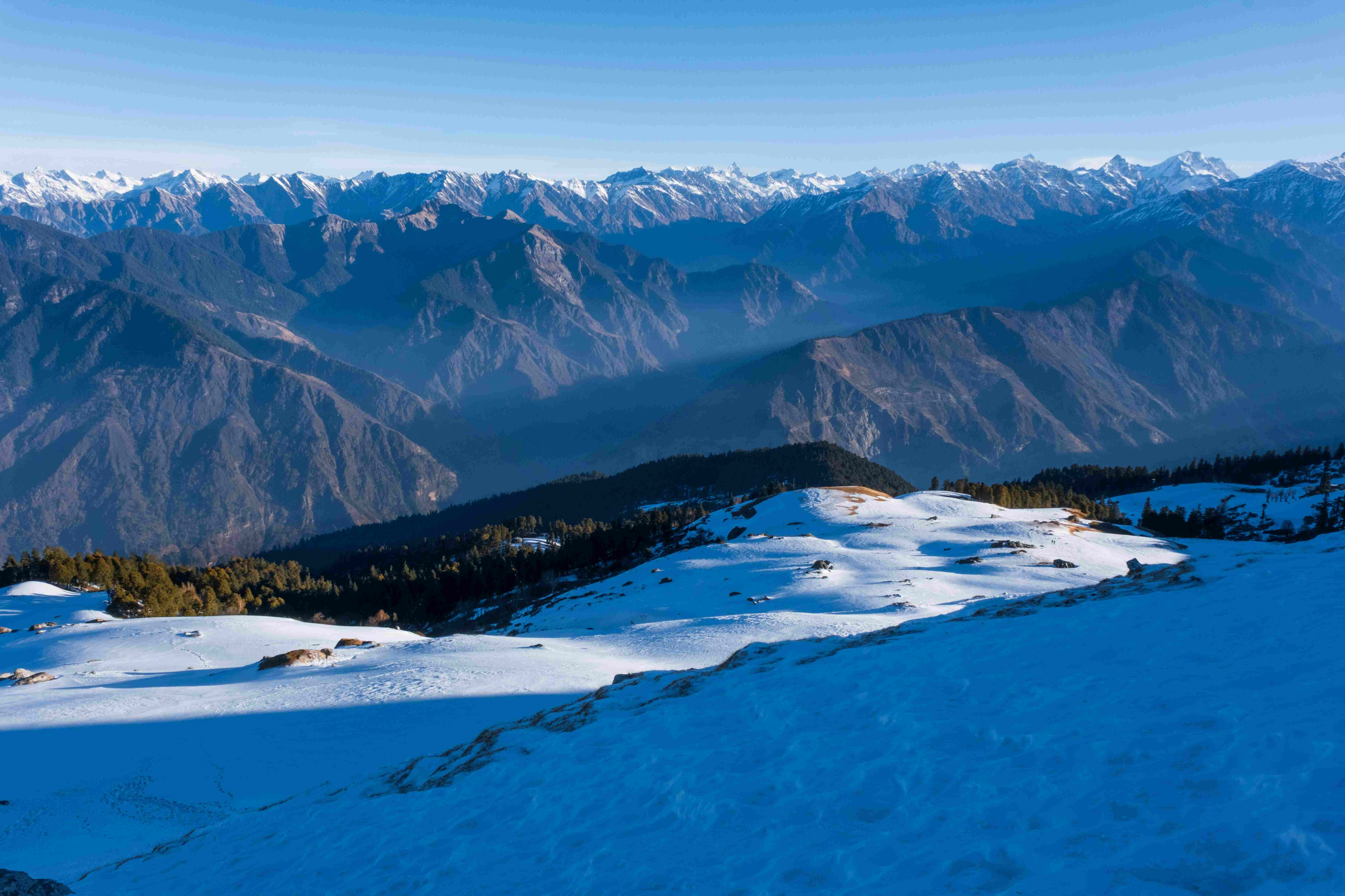Panoramic Himalayan mountain view from Kedarkantha Trek in Uttarakhand